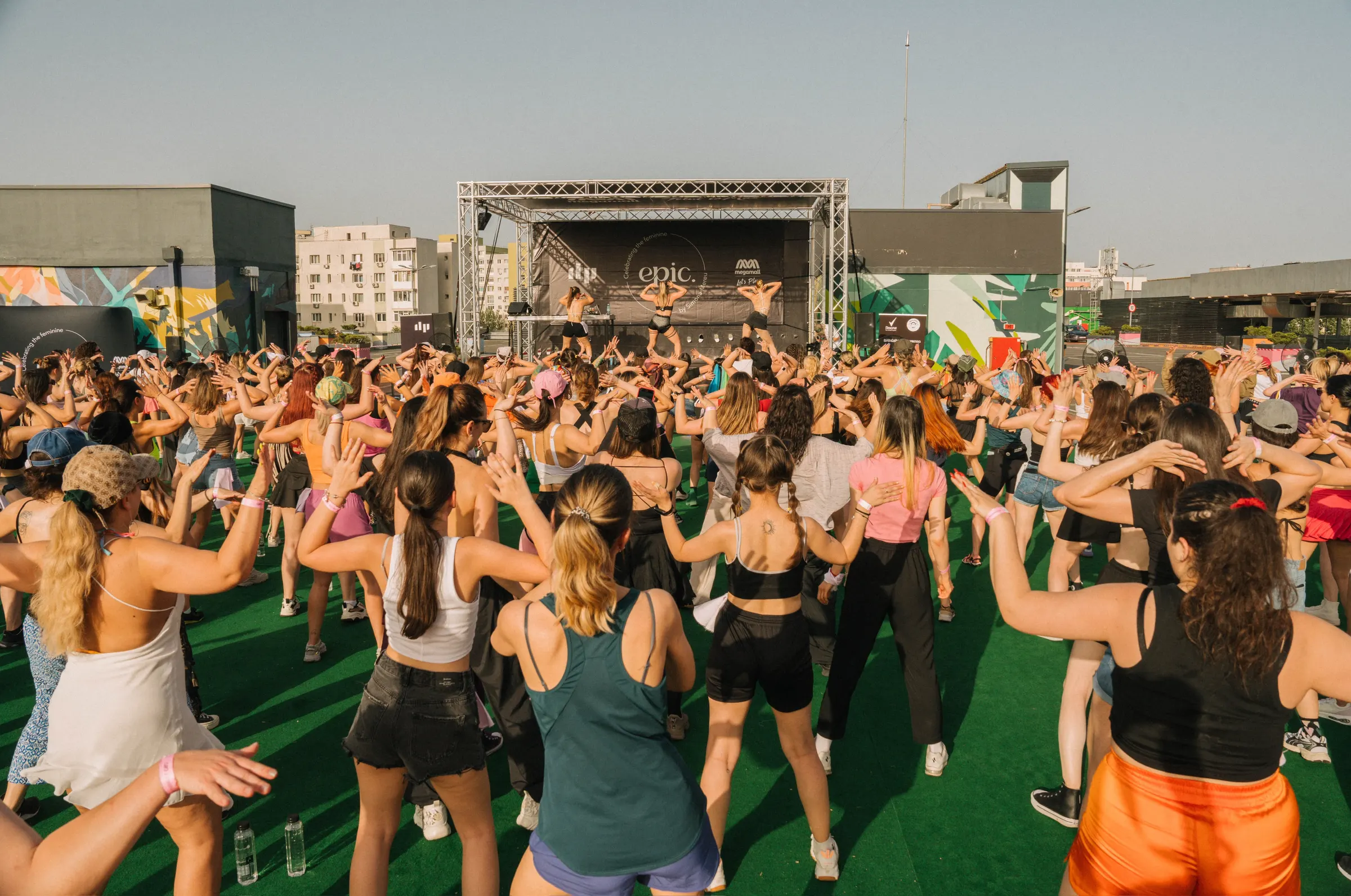 The EPIC stage on the Mega Mall rooftop, with the audience dancing